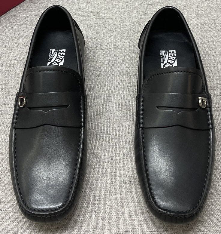 Ferragamo Black Buckle Loafers — front