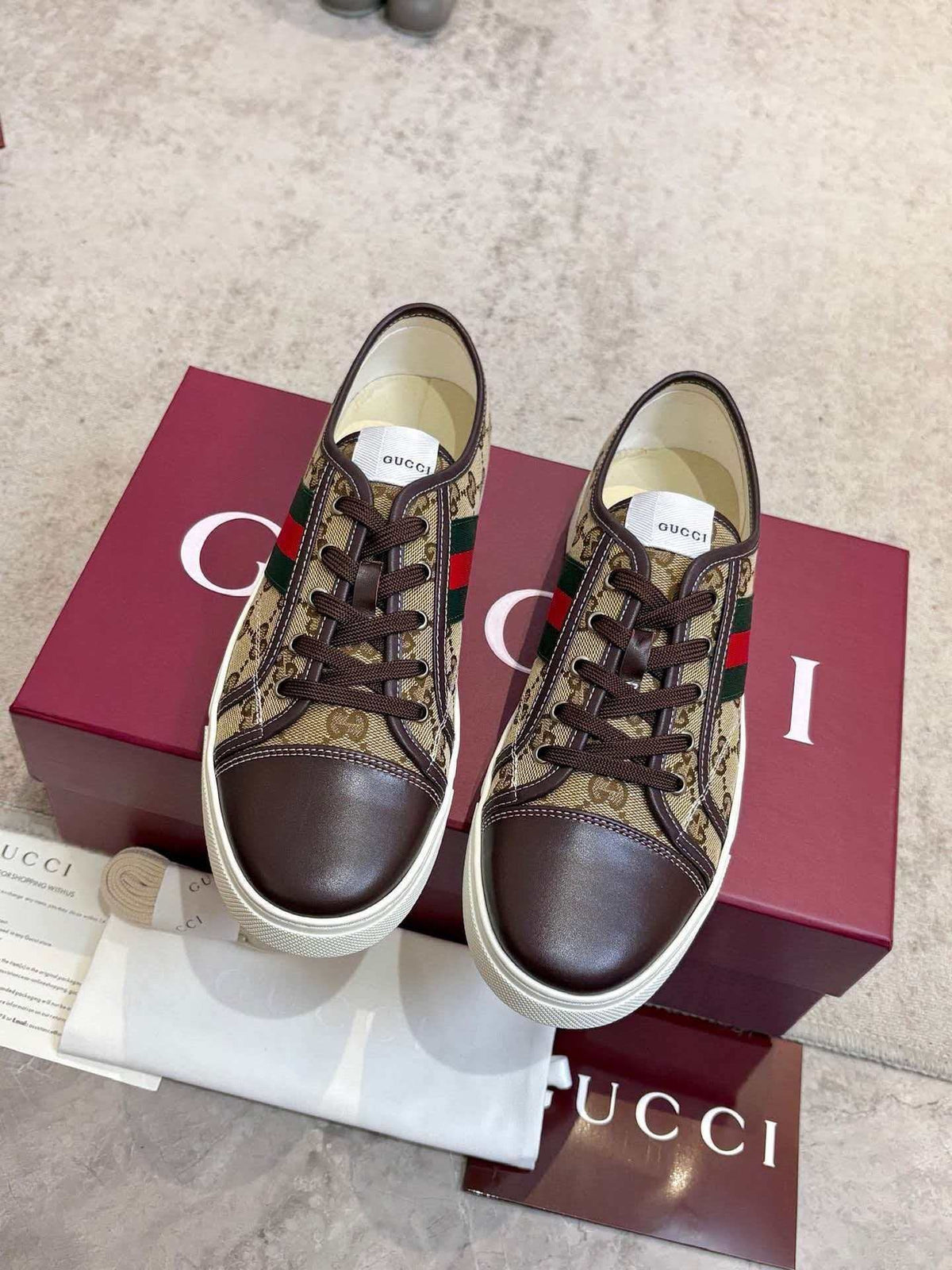 GUCCI Brown Monogram Stripe Sneakers — hero