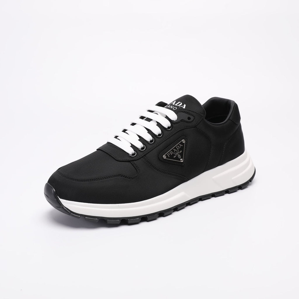 PRADA Navy Triangle Badge Sneakers — front