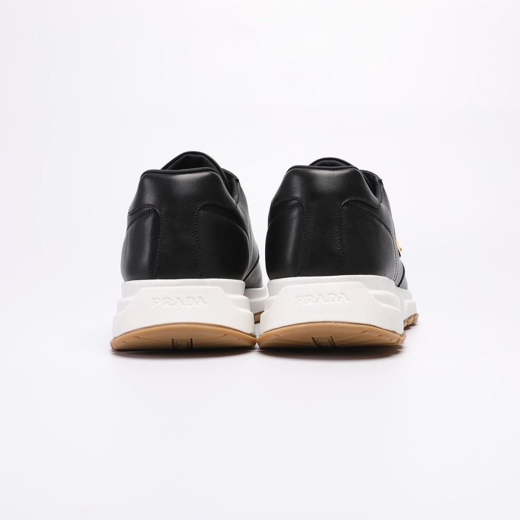 Prada Triangle Badge Low-Top Sneakers — front